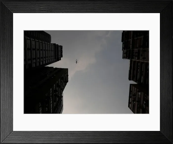 Framed Print : A helicopter flies above an anti-government rally in Wan Chai district, Hong Kong Framed Print : A helicopter flies above an anti-government rally in Wan Chai district, Hong Kong