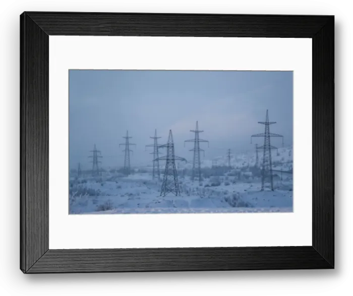 Framed Print : Power transmission lines are seen on a frosty day outside the town of Monchegorsk in Framed Print : Power transmission lines are seen on a frosty day outside the town of Monchegorsk in