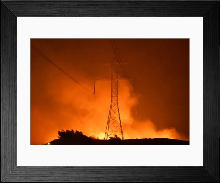 Framed Print : A wind-driven wildfire burns in Sylmar, California Framed Print : A wind-driven wildfire burns in Sylmar, California