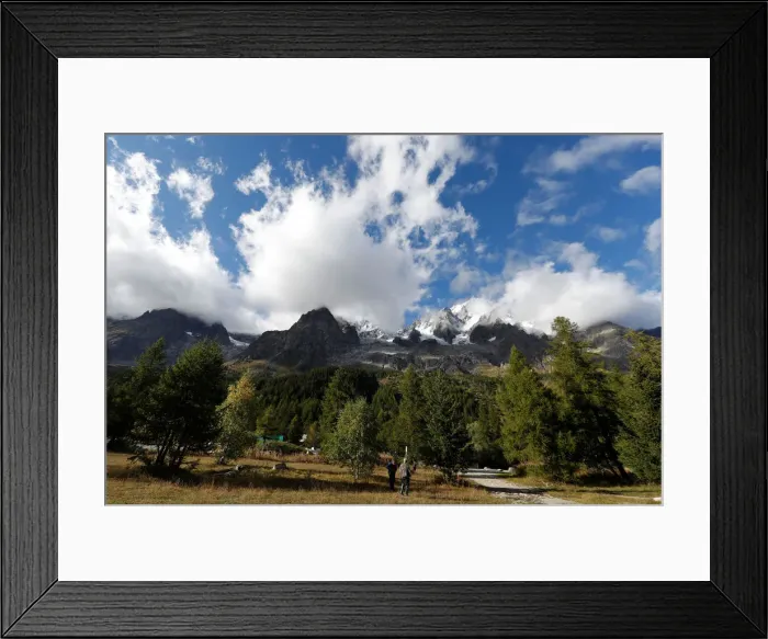 Framed Print : Two fishermen stand in front of the Italian side of the Mont Blanc massif area Framed Print : Two fishermen stand in front of the Italian side of the Mont Blanc massif area