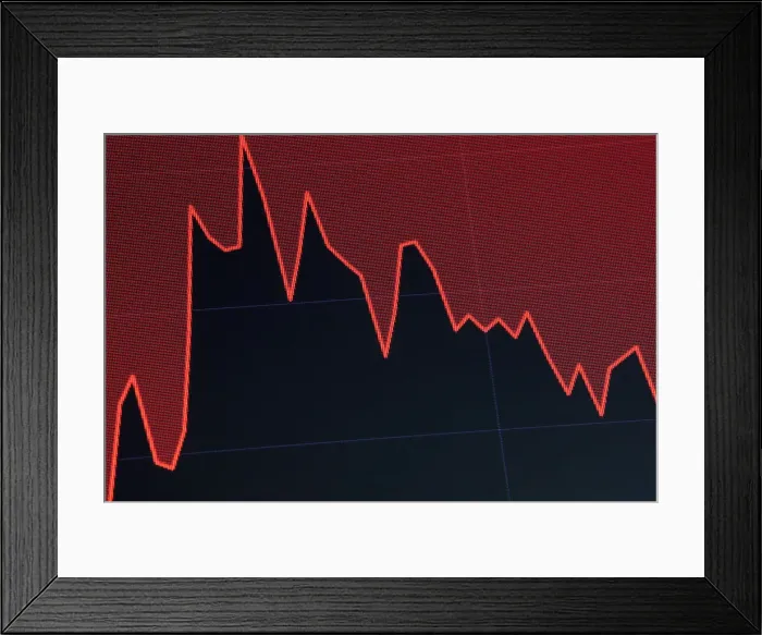 Framed Print : A screen displays a chart that tracks the Dow Jones Industrial Average on the floor Framed Print : A screen displays a chart that tracks the Dow Jones Industrial Average on the floor