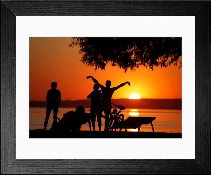 Framed Print : People enjoy sunset at a lake on the outskirts of Minsk Framed Print : People enjoy sunset at a lake on the outskirts of Minsk