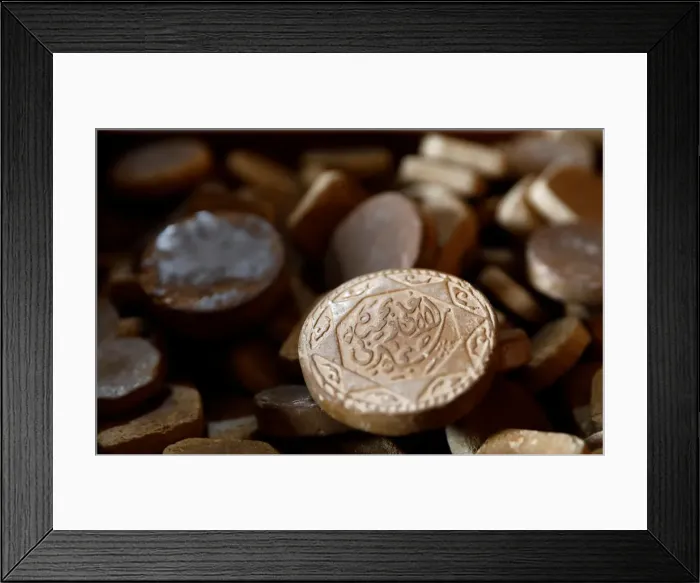 Framed Print : Turbah, a piece of wood or clay tablets which are used by shi ite Muslims on the ground Framed Print : Turbah, a piece of wood or clay tablets which are used by shi ite Muslims on the ground