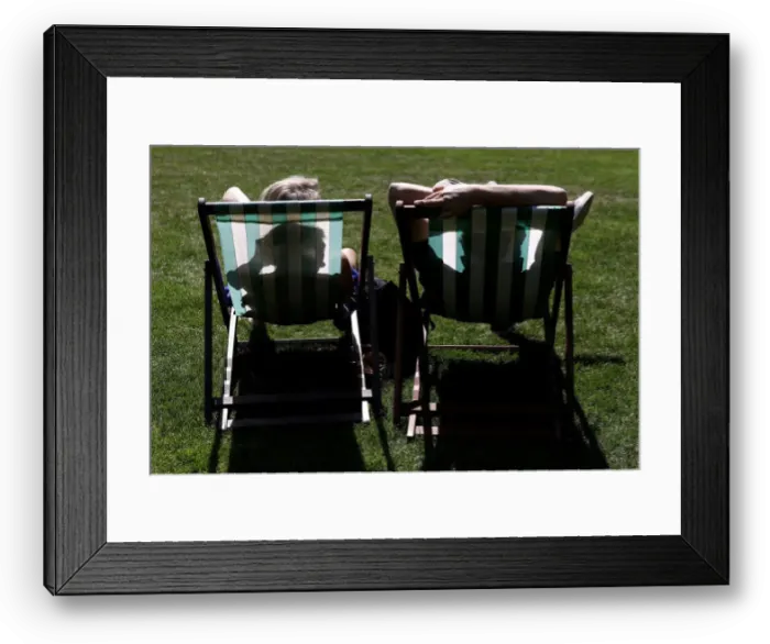 Framed Print : People sit in St Jamesas Park