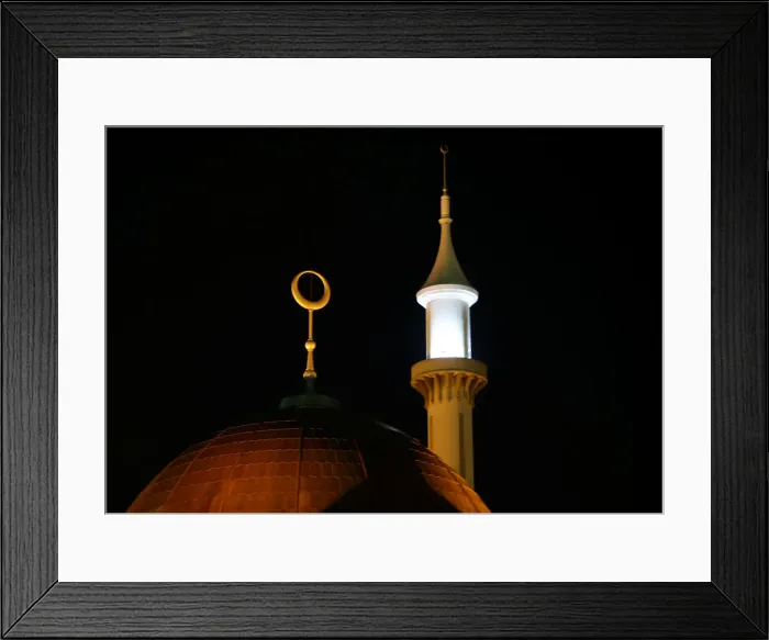 Framed Print : A minaret and a crescent moon on the Abuja central mosque are illuminated as Nigerian Framed Print : A minaret and a crescent moon on the Abuja central mosque are illuminated as Nigerian