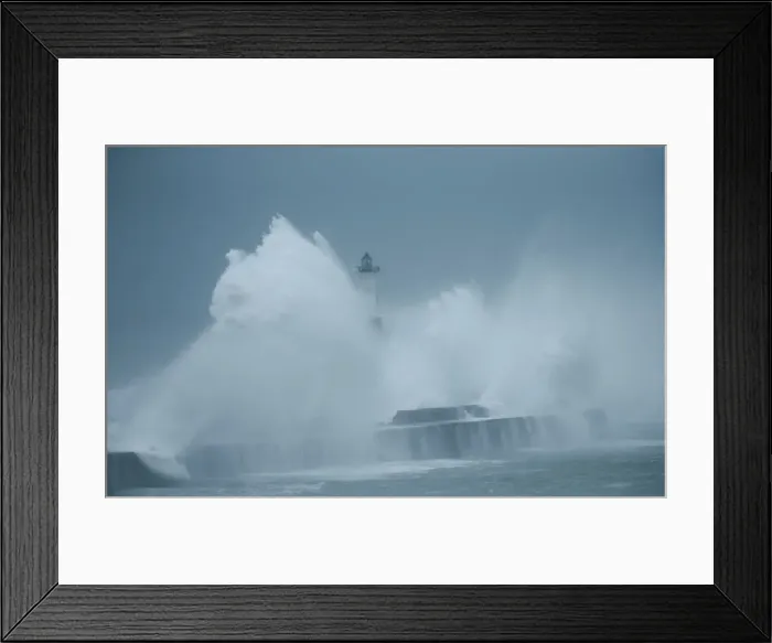Framed Print : Waves crash against a lighthouse during a windy day in Boulogne-sur-Mer Framed Print : Waves crash against a lighthouse during a windy day in Boulogne-sur-Mer