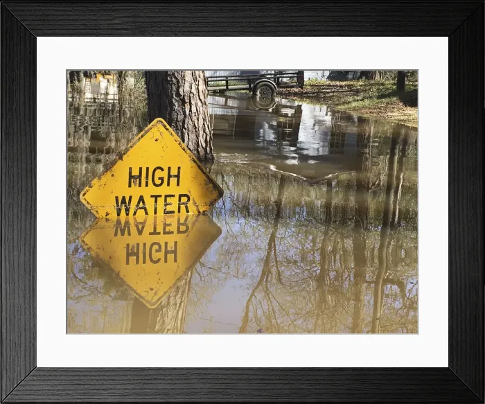 Framed Print : A high water sign is submerged near Lake Bistineau in Webster Parish Louisiana Framed Print : A high water sign is submerged near Lake Bistineau in Webster Parish Louisiana