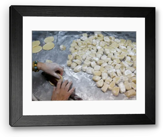 Framed Print : An employee makes mooncakes with anti-extradition bill slogans at Wah Yee Tang Bakery in Framed Print : An employee makes mooncakes with anti-extradition bill slogans at Wah Yee Tang Bakery in