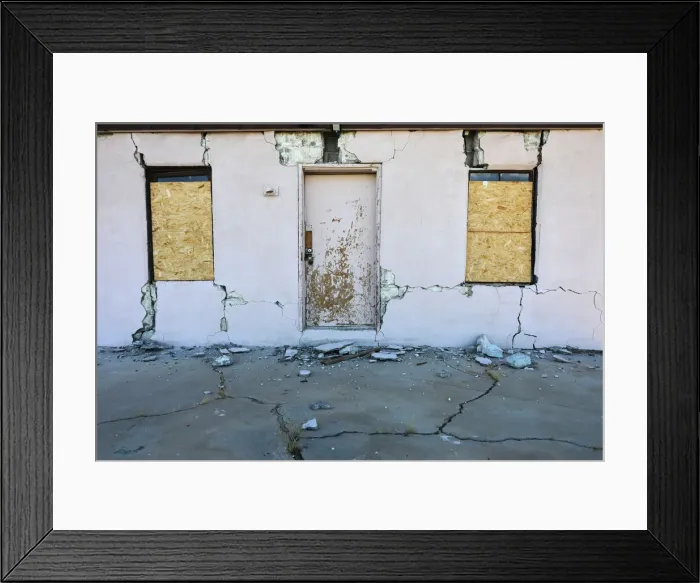 Framed Print : A house is seen damaged from a powerful earthquake that struck Southern California Framed Print : A house is seen damaged from a powerful earthquake that struck Southern California