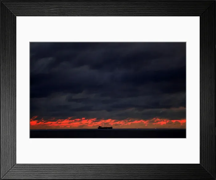 Framed Print : A ship sails towards Colombo main harbour as the rainy clouds gathered above the sunset Framed Print : A ship sails towards Colombo main harbour as the rainy clouds gathered above the sunset