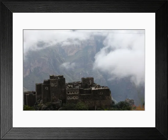 Framed Print : Fog rises above a village in the mountainous district of Haraz Framed Print : Fog rises above a village in the mountainous district of Haraz