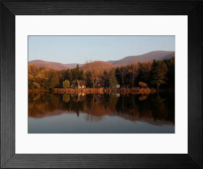 Framed Print : Autumnal foliage is relected on a lake near Belapatfalva