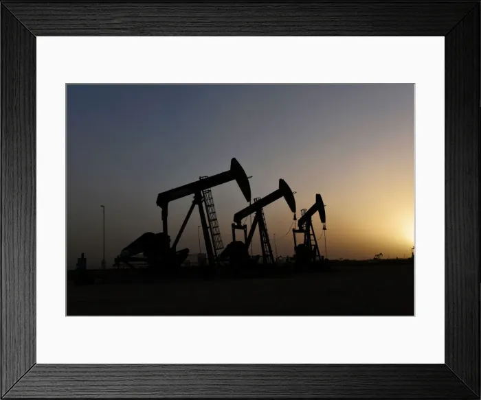 Framed Print : Pump jacks operate at sunset in Midland Framed Print : Pump jacks operate at sunset in Midland