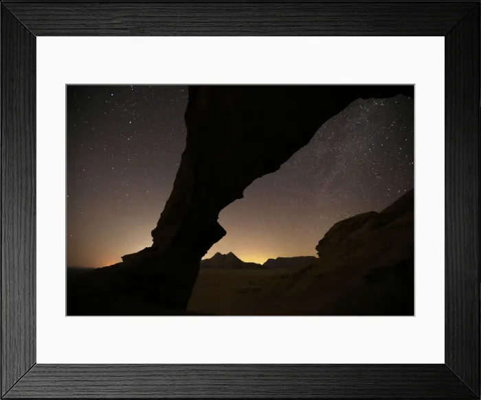 Framed Print : A general view of the stars and mountains at Al-Kharza area of Wadi Rum is seen in Framed Print : A general view of the stars and mountains at Al-Kharza area of Wadi Rum is seen in