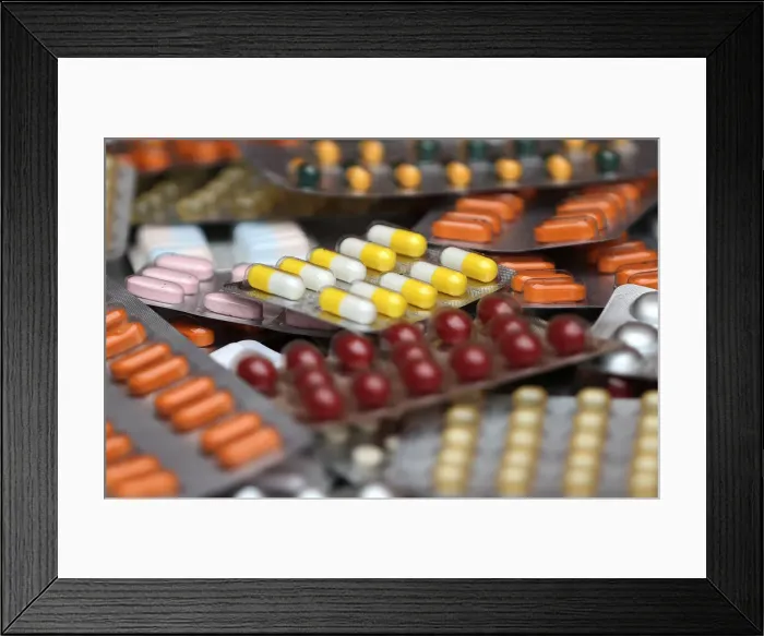 Framed Print : Illustration photo shows various medicine pills in their original packaging in Brussels Framed Print : Illustration photo shows various medicine pills in their original packaging in Brussels