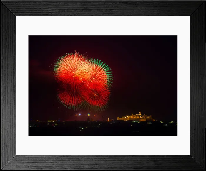Framed Print : Fireworks explode over the town of Victoria on the Maltese island of Gozo during