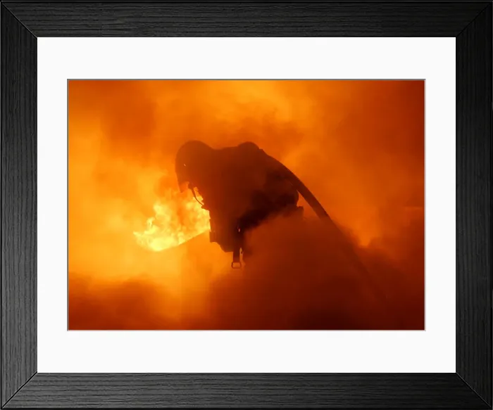 Framed Print : Firefighters extinguish a burning car during New Year celebrations in Douai Framed Print : Firefighters extinguish a burning car during New Year celebrations in Douai