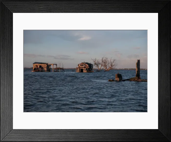 Framed Print : The Wider Image: Rising seas threaten early end for sinking village in Philippines