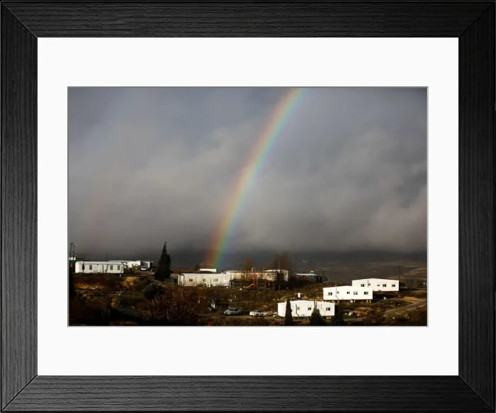 Framed Print : A rainbow is seen over the Israeli settler outpost of Amona in the occupied West Bank Framed Print : A rainbow is seen over the Israeli settler outpost of Amona in the occupied West Bank