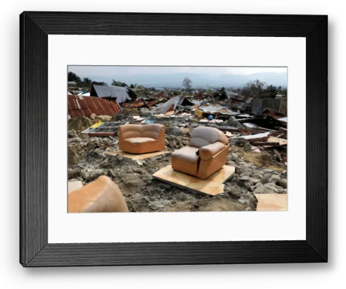 Framed Print : A sofa is seen among the ruins of a house after an earthquake hit Balaroa sub-district in Framed Print : A sofa is seen among the ruins of a house after an earthquake hit Balaroa sub-district in