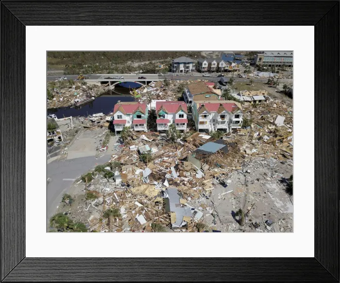 Framed Print : Aerial photo shows damaged and destroyed homes after Hurricane Michael smashed into Framed Print : Aerial photo shows damaged and destroyed homes after Hurricane Michael smashed into