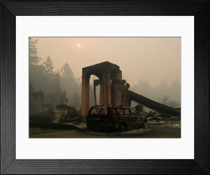 Framed Print : A destroyed home is seen at a residential neighborhood along Fountaingrove Parkway during Framed Print : A destroyed home is seen at a residential neighborhood along Fountaingrove Parkway during