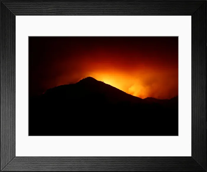 Framed Print : A hill is being silhouetted by flames during the Nuns Fire in Kenwood, California Framed Print : A hill is being silhouetted by flames during the Nuns Fire in Kenwood, California