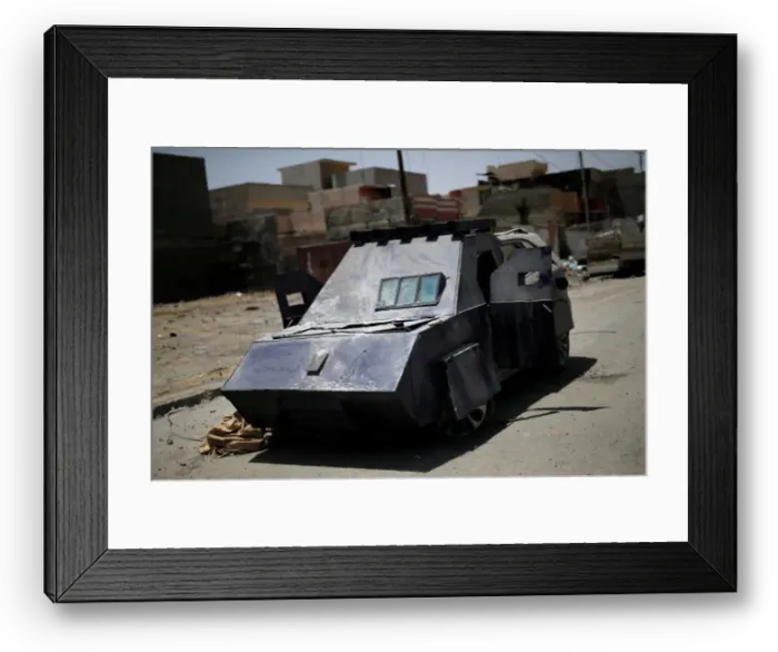 Framed Print : A vehicle used for suicide car bombings, made by Islamic State militants Framed Print : A vehicle used for suicide car bombings, made by Islamic State militants