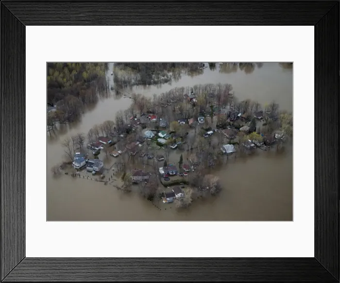 Framed Print : An overhead view showing the flooded residential neighbourhood of Ile Mercier, Quebec Framed Print : An overhead view showing the flooded residential neighbourhood of Ile Mercier, Quebec