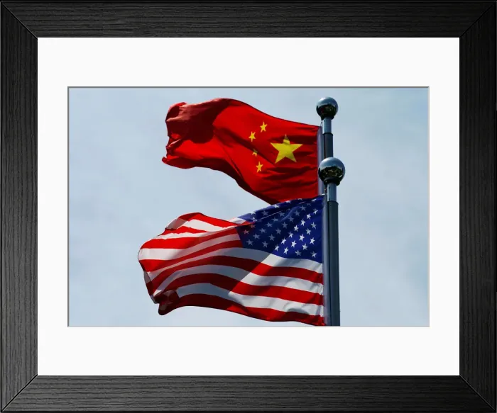 Framed Print : Chinese and U. S. flags flutter near The Bund in Shanghai Framed Print : Chinese and U. S. flags flutter near The Bund in Shanghai