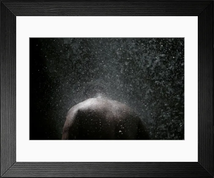 Framed Print : A Haitian man bathes during the celebration of the annual pilgrimage to the waterfall in Framed Print : A Haitian man bathes during the celebration of the annual pilgrimage to the waterfall in