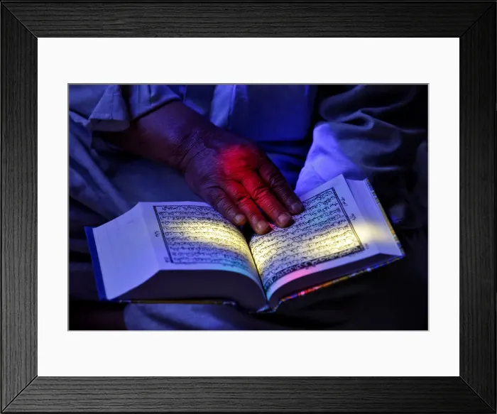 Framed Print : A man reads the Koran at the shrine of Sheikh Abdul Qadir Jeelani, a Sufi saint Framed Print : A man reads the Koran at the shrine of Sheikh Abdul Qadir Jeelani, a Sufi saint