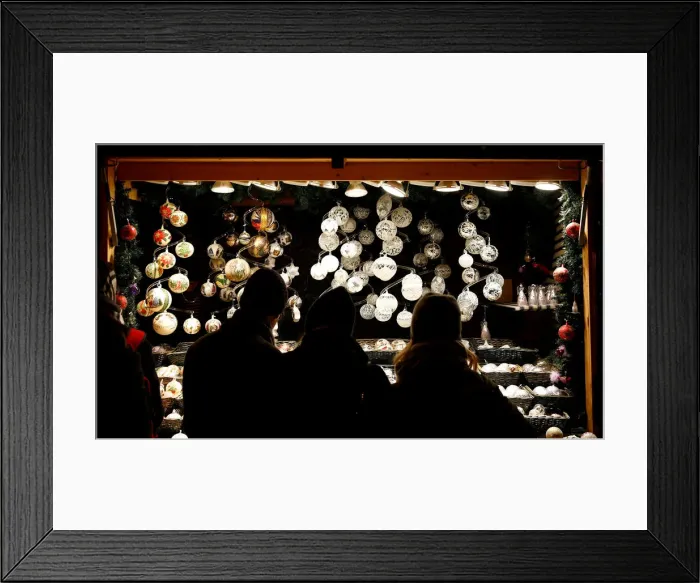 Framed Print : People look at Christmas decorations at a Christmas market in front of the Schoenbrunn