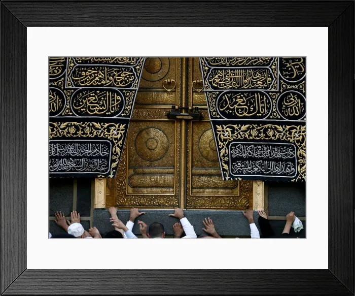 Framed Print : Muslims touch the Kaaba at the Grand Mosque during the holy fasting month of Ramadan in Framed Print : Muslims touch the Kaaba at the Grand Mosque during the holy fasting month of Ramadan in