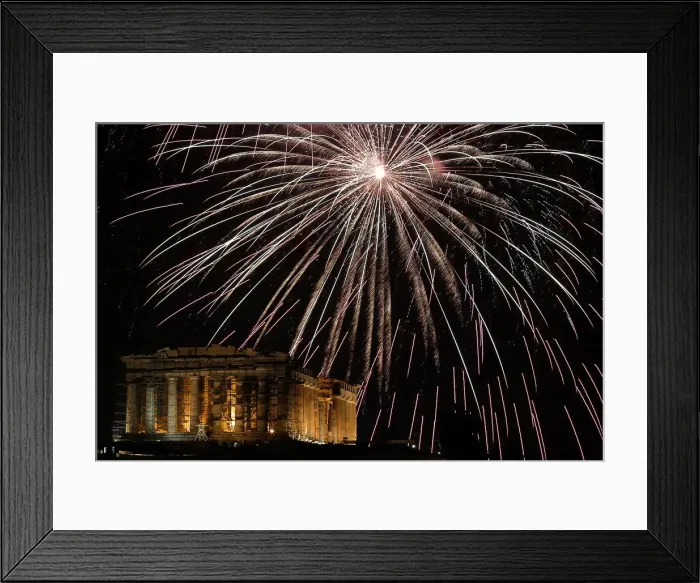 Framed Print : Fireworks explode over the ancient Parthenon temple atop the Acropolis hill during New