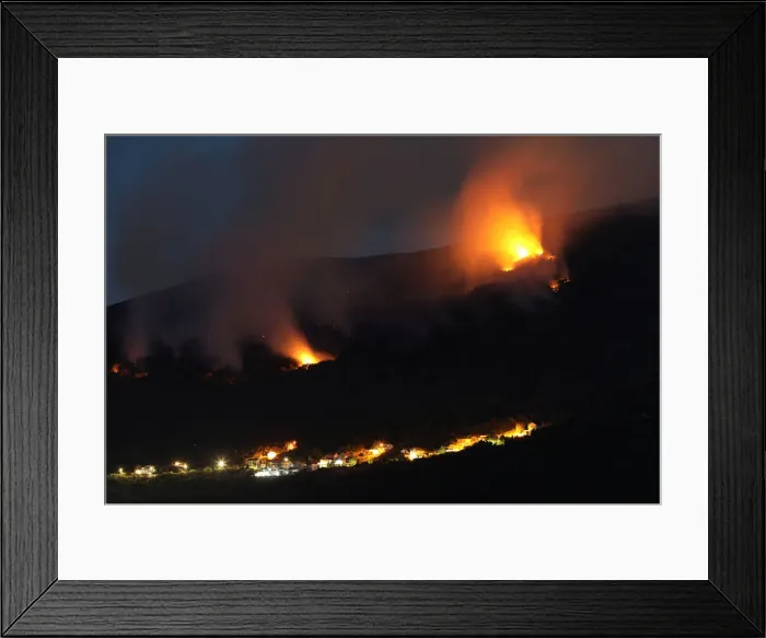 Framed Print : Forest fires are seen in Lustica peninsula near Tivat