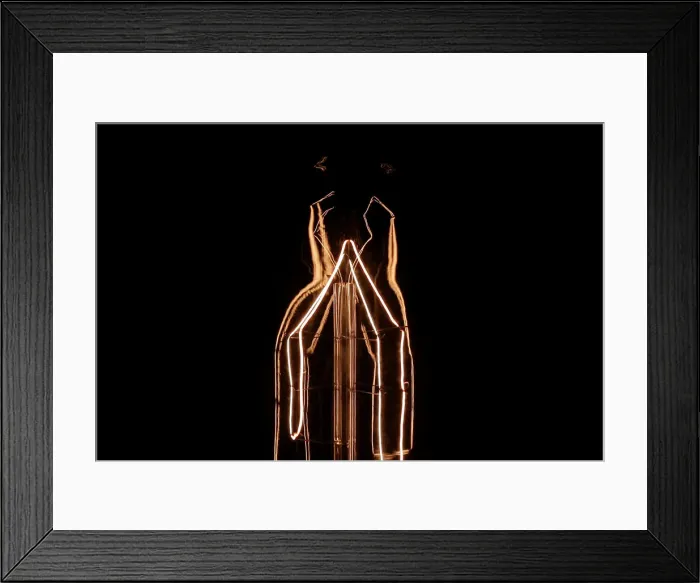 Framed Print : Detail of an incandescent light bulb in Athens