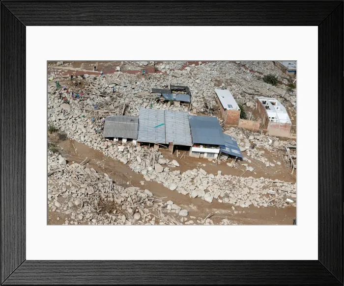 Framed Print : Aerial view of a neighborhood destroyed after flooding and mudslides caused by heavy Framed Print : Aerial view of a neighborhood destroyed after flooding and mudslides caused by heavy