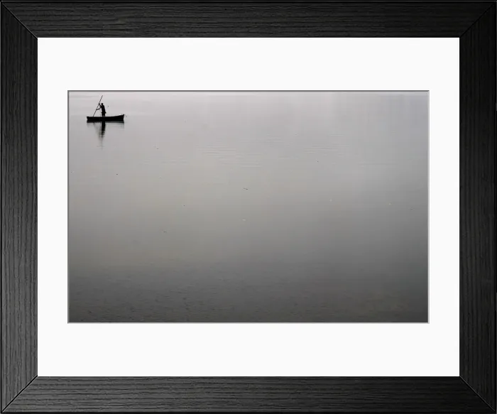 Framed Print : Fisherman is seen during a rainy day at the Rodrigo de Freitas lagoon in Rio de Janeiro Framed Print : Fisherman is seen during a rainy day at the Rodrigo de Freitas lagoon in Rio de Janeiro