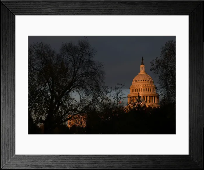 Framed Print : The U. S. Capitol building is pictured at sunset on Capitol Hill in Washington Framed Print : The U. S. Capitol building is pictured at sunset on Capitol Hill in Washington