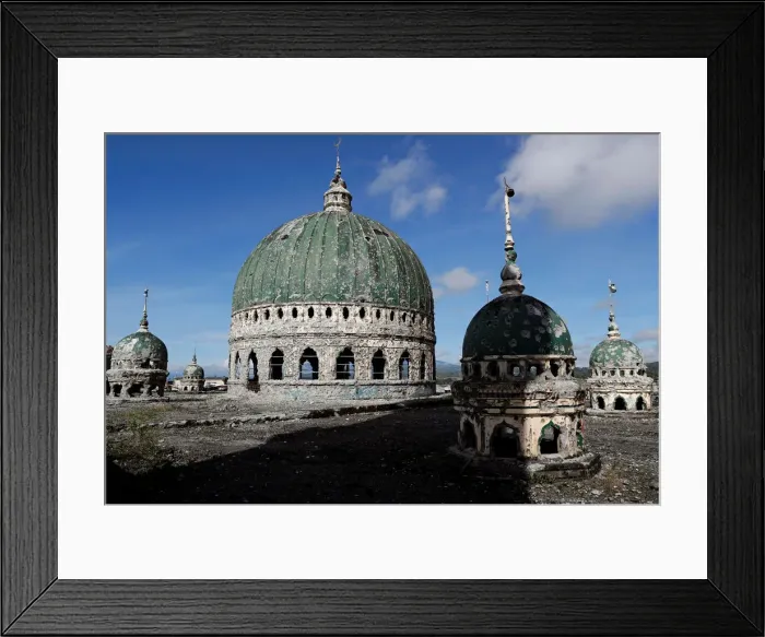 Framed Print : The bullet-riddled domes of Grand Mosque are seen, after residents were allowed to return Framed Print : The bullet-riddled domes of Grand Mosque are seen, after residents were allowed to return
