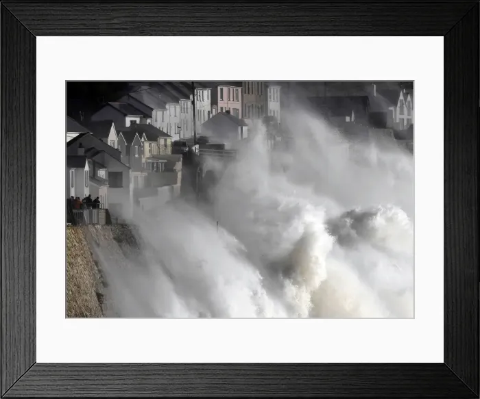 Framed Print : Large waves crash along sea defences and the harbour as storm Ophelia approaches