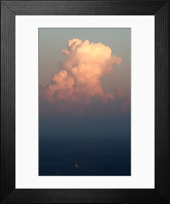 Framed Print : A sailing boat is seen at the sunset in front of Filicudi island Framed Print : A sailing boat is seen at the sunset in front of Filicudi island
