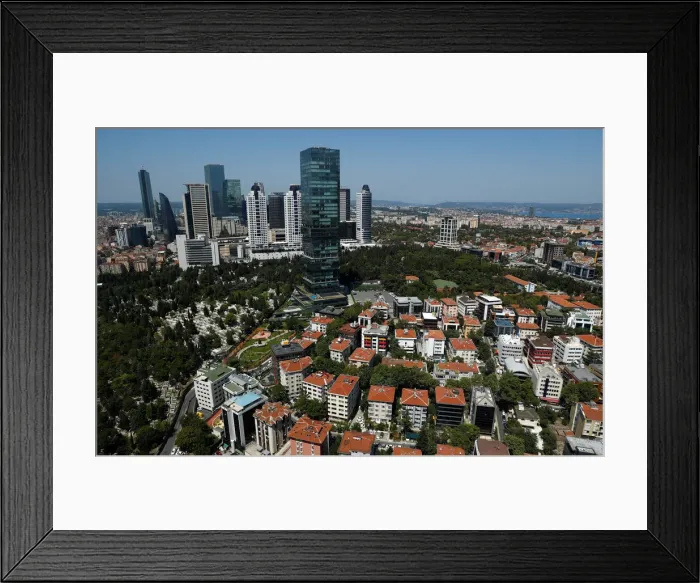 Framed Print : Skyscrapers of banks headquarters and popular shopping malls are pictured next to Framed Print : Skyscrapers of banks headquarters and popular shopping malls are pictured next to