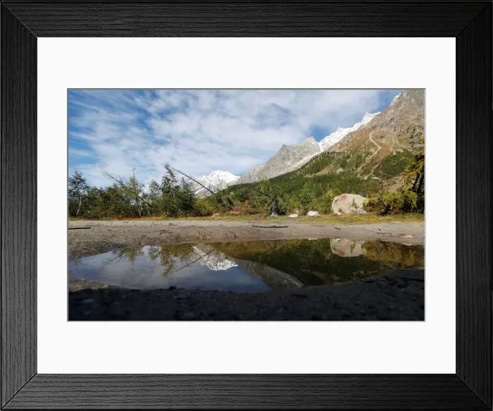 Framed Print : A segment of the Planpincieux glacier is reflected in water on the Italian side of Framed Print : A segment of the Planpincieux glacier is reflected in water on the Italian side of