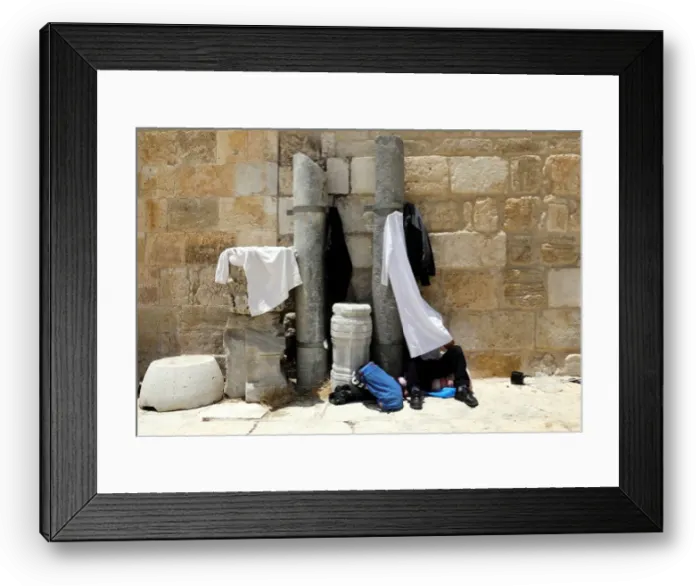 Framed Print : A Palestinian man reads the Koran in the compound known to Muslims as Noble Sanctuary Framed Print : A Palestinian man reads the Koran in the compound known to Muslims as Noble Sanctuary