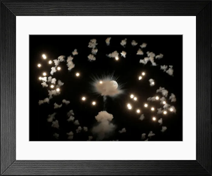 Framed Print : Fireworks explode in front of the full moon during celebrations marking the feast of