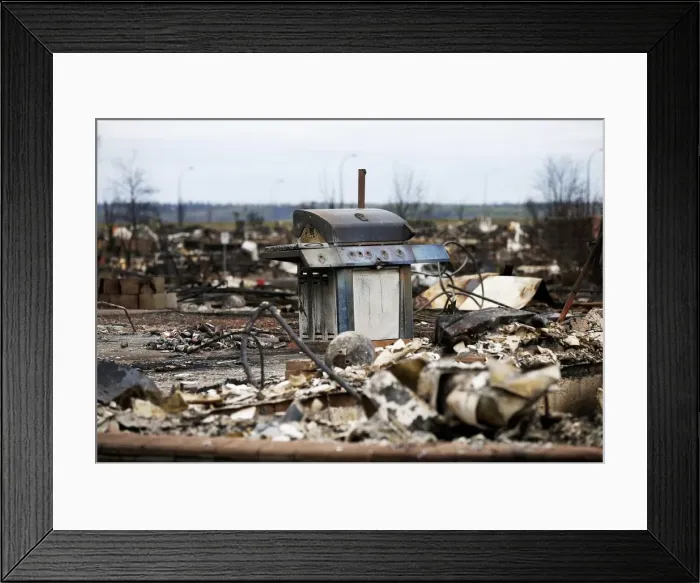Framed Print : The burnt remains of a barbecue are pictured in the Beacon Hill neighbourhood of Fort