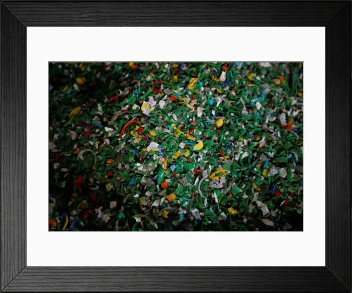 Framed Print : Chips made from recycled plastic bottles are seen before being processed at the Weeco Framed Print : Chips made from recycled plastic bottles are seen before being processed at the Weeco