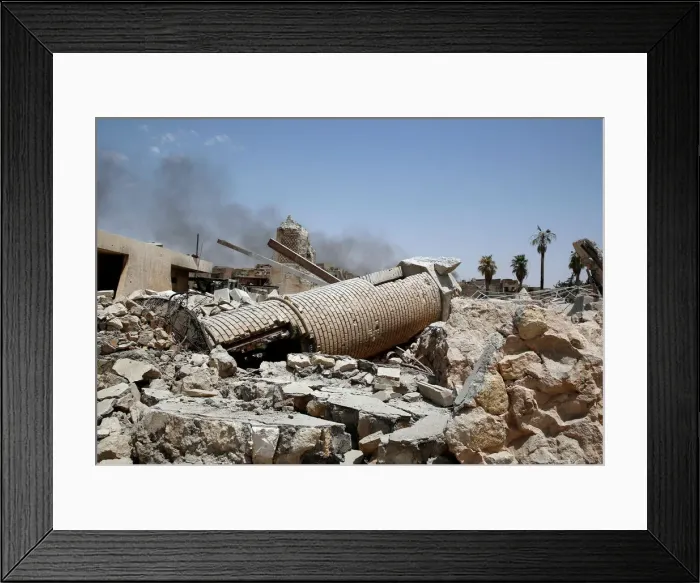 Framed Print : The remains of al-Hadba minaret at the Grand al-Nuri Mosque are pictured in the Old City Framed Print : The remains of al-Hadba minaret at the Grand al-Nuri Mosque are pictured in the Old City